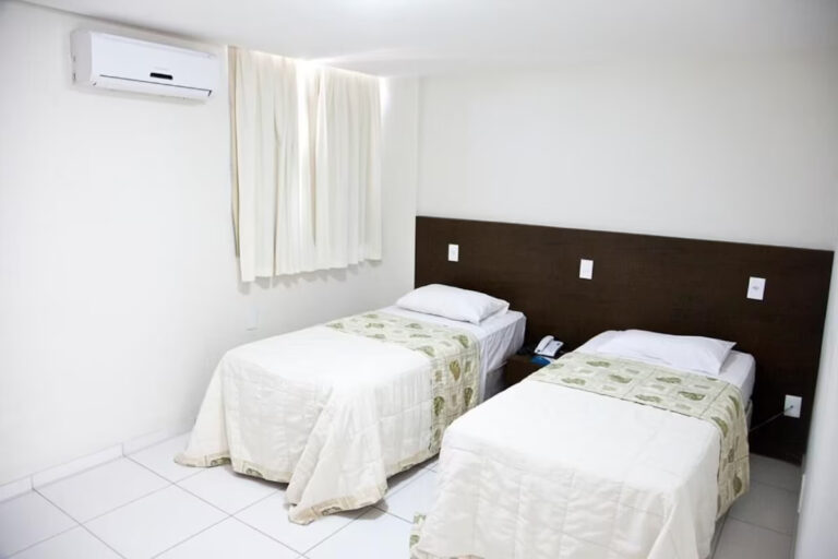quarto jb hotel camas solteiro